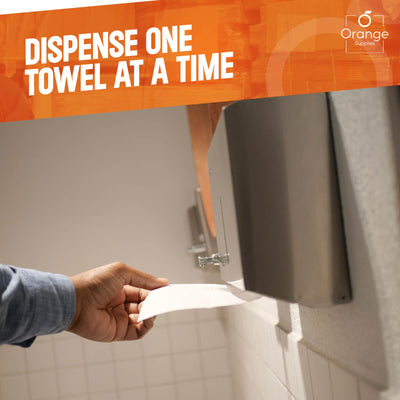 Hand pulling a single white paper towel from a wall dispenser.