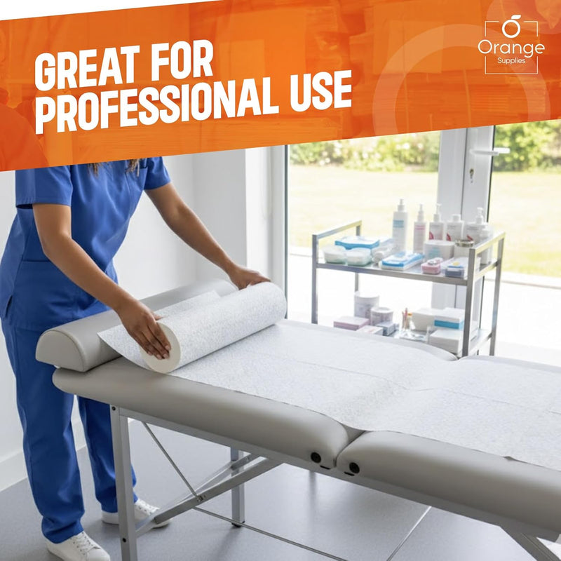 Nurse applying fresh white paper roll to a medical examination bed.